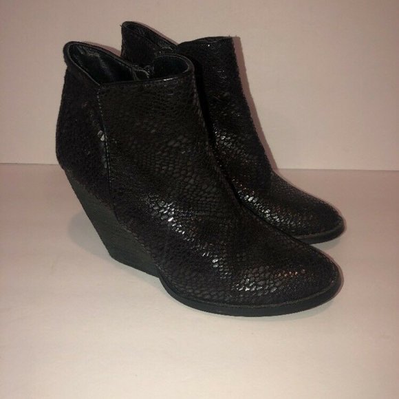 very volatile black booties